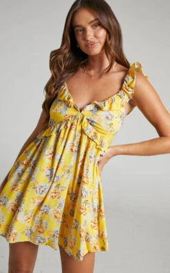 Showpo Serenyo Ruffle Detail V Neck Low Back Skater Mini Dress In Yellow Floral