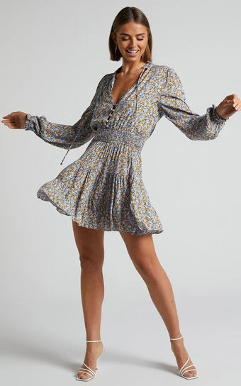 Showpo Luisella Long Sleeve Shirred Waist Mini Dress In Blue Ditsy Floral 1 Showpo Luisella Long Sleeve Shirred Waist Mini Dress In Blue Ditsy Floral
