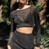 Showpo Khaimy Glitter Mesh LONG SLEEVE CROP TOP AND MINI SKIRT TWO PIECE SET In Black