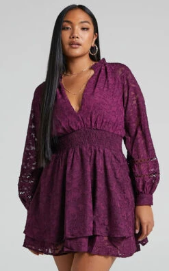 Showpo Millahna Long Sleeve Circle Trim Tiered Mini Dress In Plum