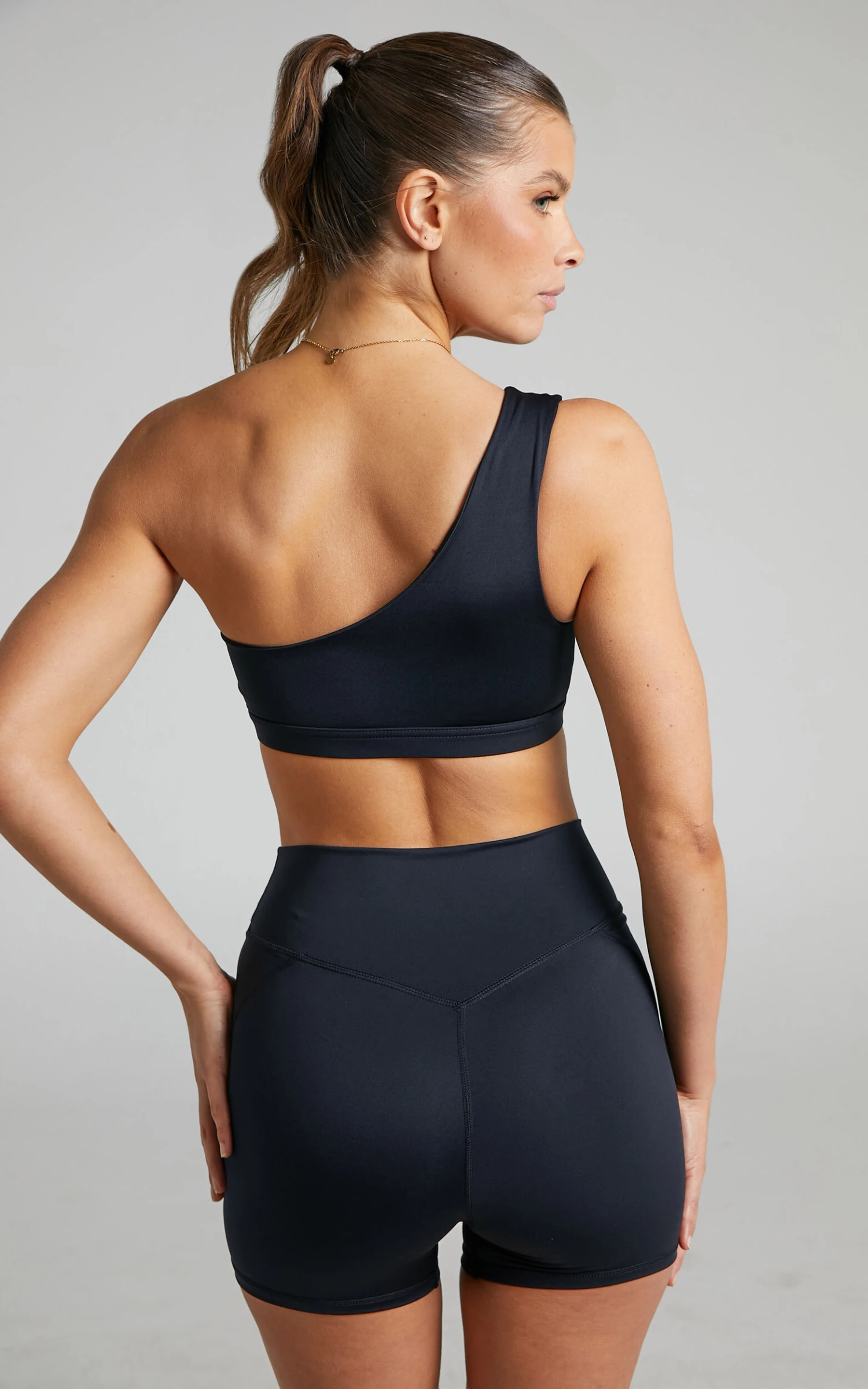 Showpo Vienna One Shoulder Sports Bra In Black 4 Showpo Vienna One Shoulder Sports Bra In Black - Image 4