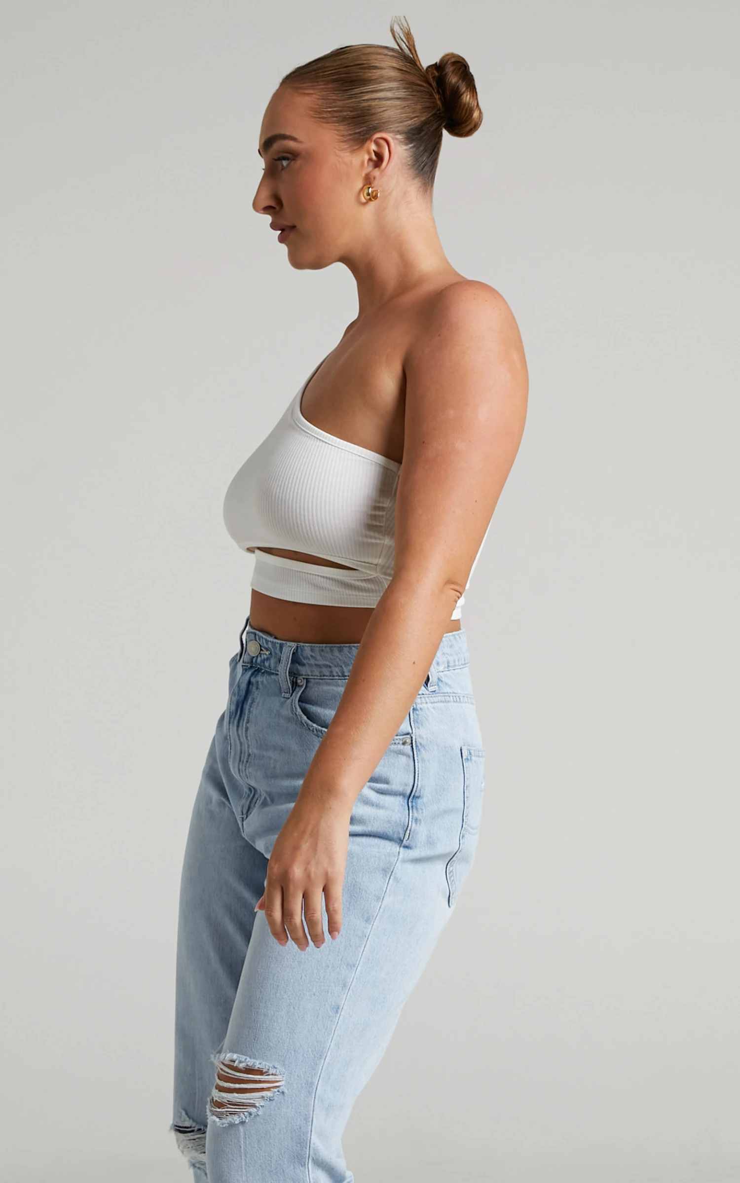 Showpo Joellyn Asymmetric Front Cut Out Ribbed Crop Tank In White 6 Showpo Joellyn Asymmetric Front Cut Out Ribbed Crop Tank In White - Image 6