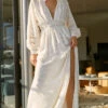 Showpo Abellita Plunge Neck Bishop Sleeve Broderie Trim Maxi Dress In Cream