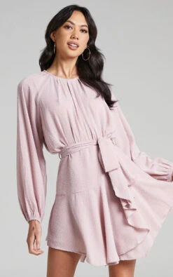 Showpo Adleigh Asymmetric Hem Long Sleeve Mini Dress In Pink