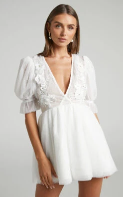 Showpo Akshia Mini Dress - Puff Sleeve Floral Detail Plunge Neck Dress In White 12 Showpo Akshia Mini Dress - Puff Sleeve Floral Detail Plunge Neck Dress In White -Showpo Women's Clothing Store Akshia PUFF SLEEVE MINI DRESS in White 2528SD22090007012529 3