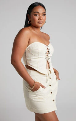 Showpo Alesana Mini Skirt - Button Through A-line Skirt In Cream 9 Showpo Alesana Mini Skirt - Button Through A-line Skirt In Cream -Showpo Women's Clothing Store Alesana Button Through A line Mini Skirt in Cream 2528SB22090005022529 3