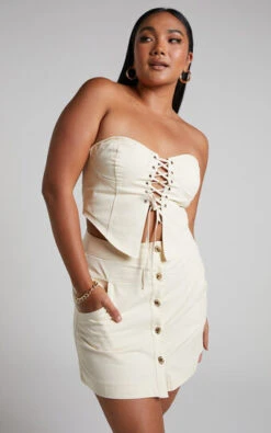 Showpo Alesana Mini Skirt - Button Through A-line Skirt In Cream