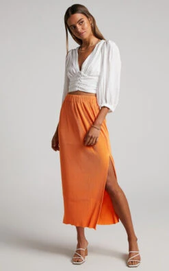 Showpo Amarante Midi Skirt - Side Split Plisse Skirt In Orange