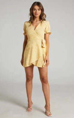 Showpo Azelle Wrap Mini Dress In Yellow Floral