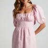 Showpo Branson Short Puff Sleeve Tie Back Mini Dress In Pink