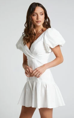 Showpo Brighton Puff Sleeve Ruffle Mini Dress In White 14 Showpo Brighton Puff Sleeve Ruffle Mini Dress In White -Showpo Women's Clothing Store Brighton Puff Sleeve Ruffle Mini Dress in White 4