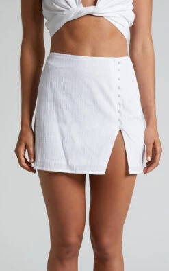 Showpo Celinna Mini Skirt - Button Through Skirt In White 14 Showpo Celinna Mini Skirt - Button Through Skirt In White -Showpo Women's Clothing Store Celinna Button Through Mini Skirt in White 7