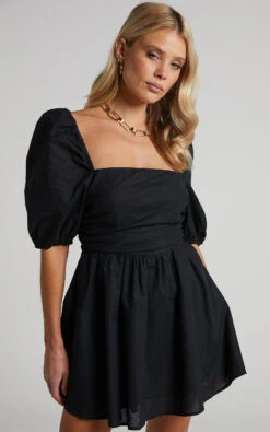 Showpo Claudina Mini Dress - Puff Sleeve Ruched Bodice Dress In Black 12 Showpo Claudina Mini Dress - Puff Sleeve Ruched Bodice Dress In Black -Showpo Women's Clothing Store Claudina Ruched Bodice Puff Sleeve Mini Dress in Black 2528SD22110043022529 2