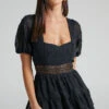 Showpo Deiene Lace Trim Broderie Tiered Mini Dress In Black