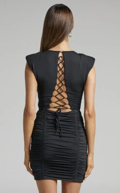 Showpo Divone Lace Tie Back Ruched Bodycon Mini Dress In Black -Showpo Women's Clothing Store Divone Shoulder Pad Open Back Ruched Bodycon Mini Dress in Black 2528SD22040069022529 2