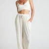 Showpo Elowen Two Piece Set - Plisse Crop Top And Relaxed Wide Leg Pants In Cream