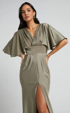 Showpo Gemalyn Maxi Dress - Angel Sleeve V Neck Split Dress In Olive 14 Showpo Gemalyn Maxi Dress - Angel Sleeve V Neck Split Dress In Olive -Showpo Women's Clothing Store Gemalyn Plunge Neck Gown with Front Split in Olive 4