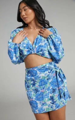 Showpo Geneve Wrap Side Tie Printed Mini Skirt In Geneve Blue Floral 12 Showpo Geneve Wrap Side Tie Printed Mini Skirt In Geneve Blue Floral -Showpo Women's Clothing Store Geneve printed Tie Front Mini Skirt in Geneve Blue Floral 2528SB22020017012529 9