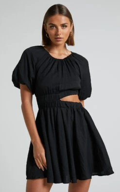 Showpo Hadley Puff Sleeve Cut Out Mini Dress In Black 12 Showpo Hadley Puff Sleeve Cut Out Mini Dress In Black -Showpo Women's Clothing Store Hadley Puff sleeve cut out mini dress in Black 1
