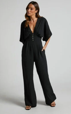 Showpo Hanlou Flutter Sleeve V-neck Button Front Wide Leg Jumpsuit In Black