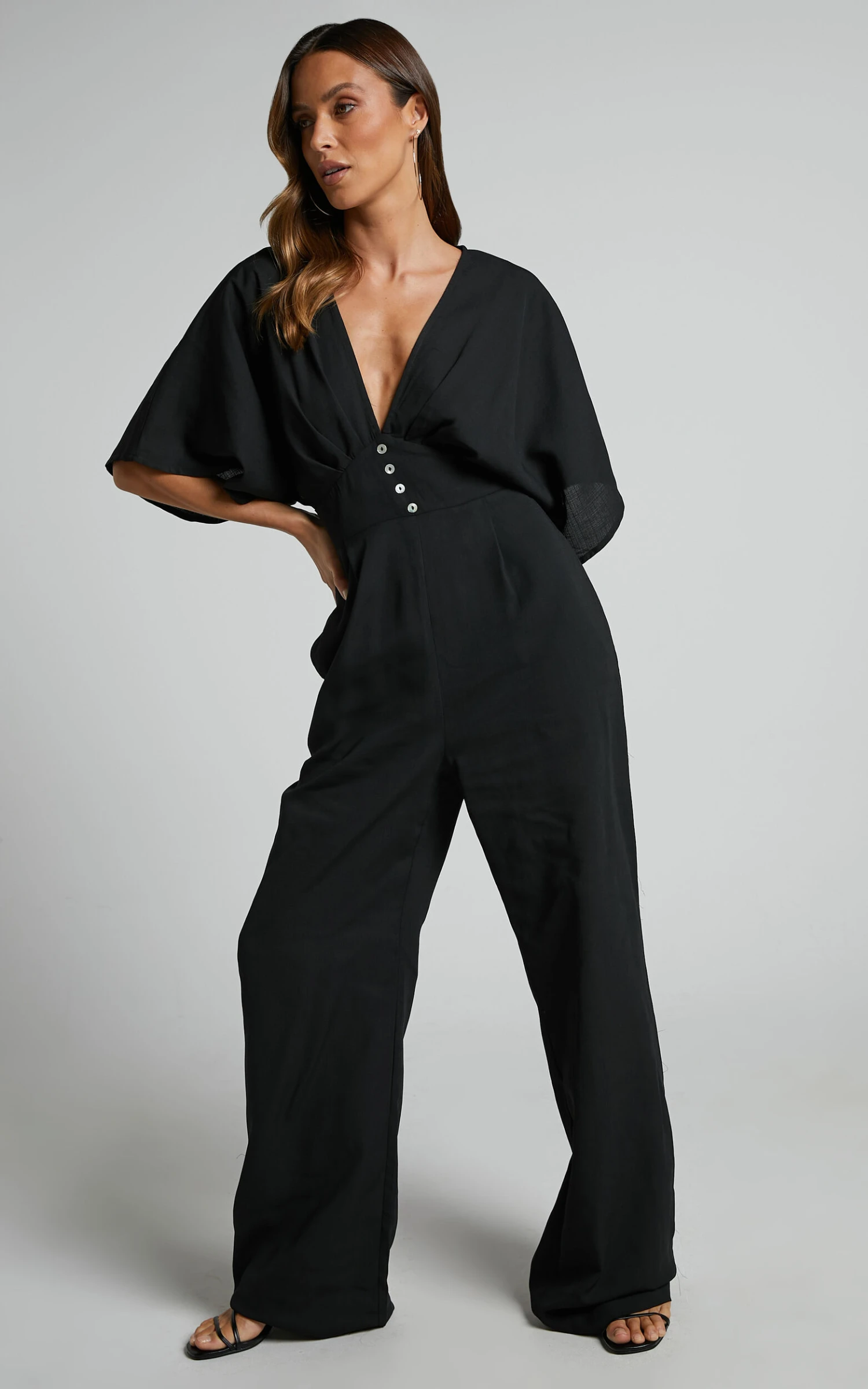 Showpo Hanlou Flutter Sleeve V-neck Button Front Wide Leg Jumpsuit In Black 5 Showpo Hanlou Flutter Sleeve V-neck Button Front Wide Leg Jumpsuit In Black - Image 5
