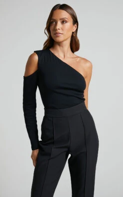 Showpo Henley Top - One Shoulder Cut Out Long Sleeve Top In Black 10 Showpo Henley Top - One Shoulder Cut Out Long Sleeve Top In Black -Showpo Women's Clothing Store Henley Top One Shoulder Cut Out Long Sleeve Top in Black 2