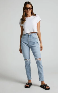 Showpo Izira High Waisted Ripped Mom Jeans In Mid Blue Wash 14 Showpo Izira High Waisted Ripped Mom Jeans In Mid Blue Wash -Showpo Women's Clothing Store Izira Ripped Mom Jeans in Mid Blue Wash 10