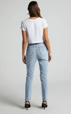 Showpo Izira High Waisted Ripped Mom Jeans In Mid Blue Wash 16 Showpo Izira High Waisted Ripped Mom Jeans In Mid Blue Wash -Showpo Women's Clothing Store Izira Ripped Mom Jeans in Mid Blue Wash 5