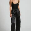 Showpo Jadeiah - Mid Rise Cargo Pocket Satin Jogger Pant In Black