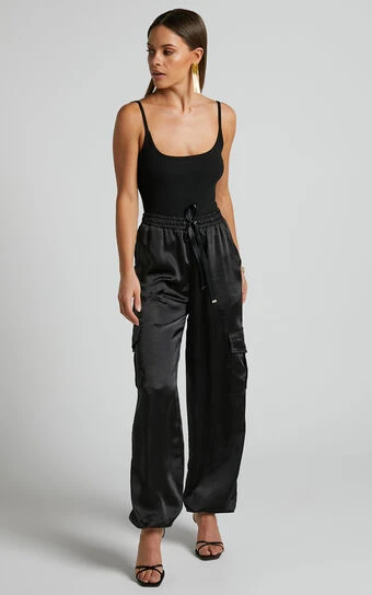 Showpo Jadeiah - Mid Rise Cargo Pocket Satin Jogger Pant In Black 1 Showpo Jadeiah - Mid Rise Cargo Pocket Satin Jogger Pant In Black