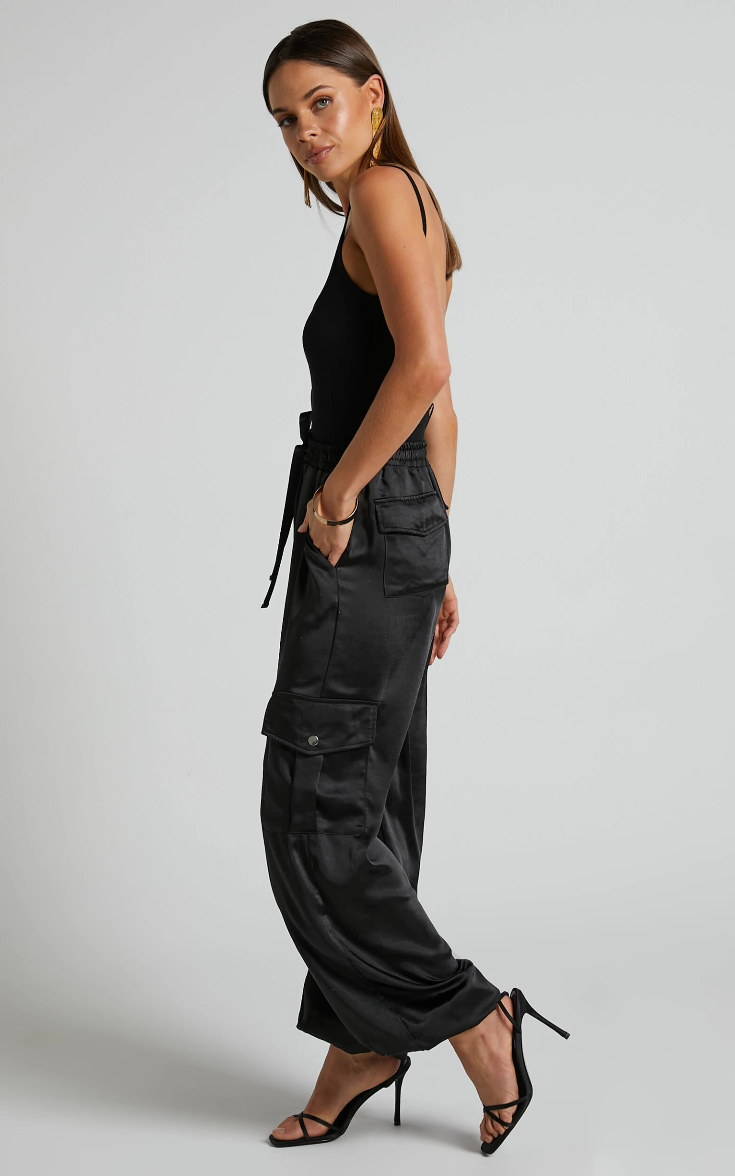 Showpo Jadeiah - Mid Rise Cargo Pocket Satin Jogger Pant In Black 5 Showpo Jadeiah - Mid Rise Cargo Pocket Satin Jogger Pant In Black - Image 5
