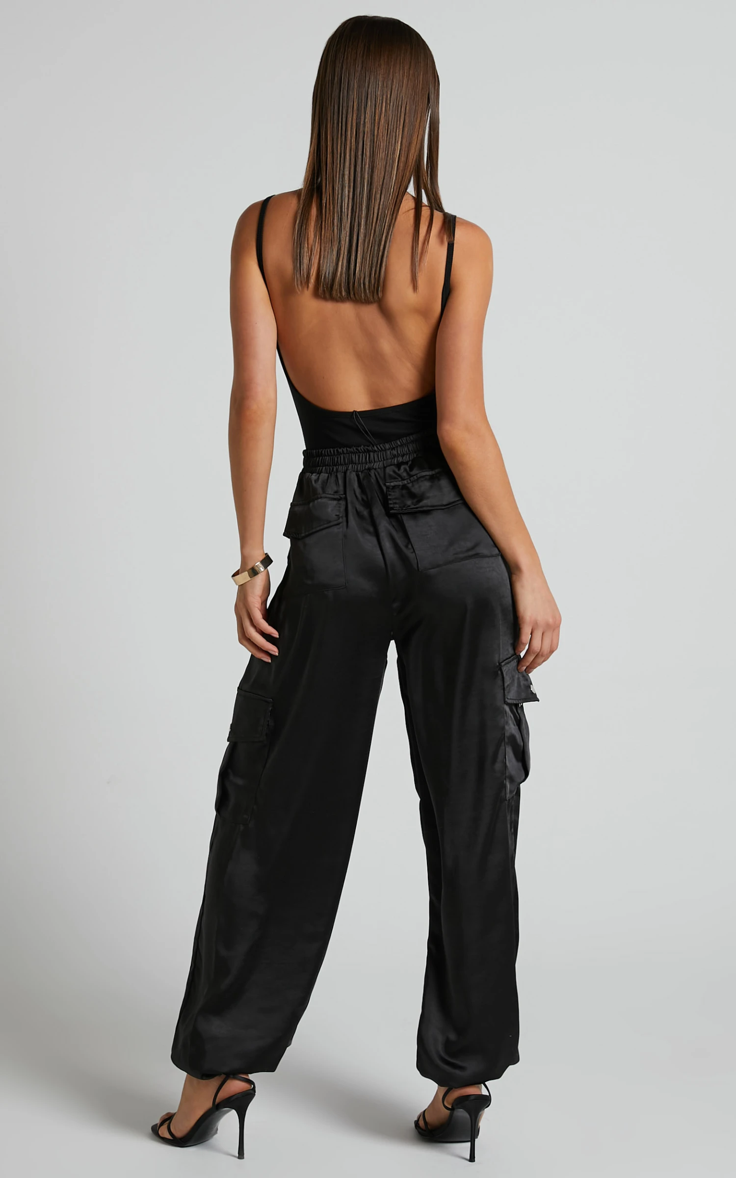 Showpo Jadeiah - Mid Rise Cargo Pocket Satin Jogger Pant In Black 8 Showpo Jadeiah - Mid Rise Cargo Pocket Satin Jogger Pant In Black - Image 8