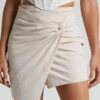 Showpo Kiandra Knot Detail Mini Skirt In Beige