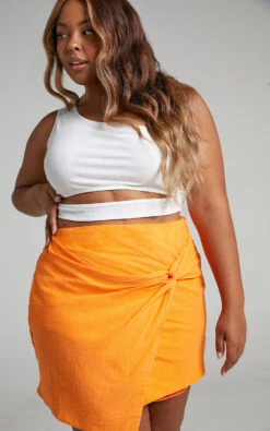 Showpo Kiandra Knot Detail Mini Skirt In Orange 11 Showpo Kiandra Knot Detail Mini Skirt In Orange -Showpo Women's Clothing Store Kiandra Knot Detail Mini Skirt in Orange 2528SB21070036042529 3