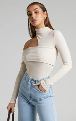 Showpo Kiefer Asymmetric Long Sleeve Cutout Top In Cream 11 Showpo Kiefer Asymmetric Long Sleeve Cutout Top In Cream -Showpo Women's Clothing Store Kiefer Asymmetric Cutout Top in Cream 2528ST21050005042529 11