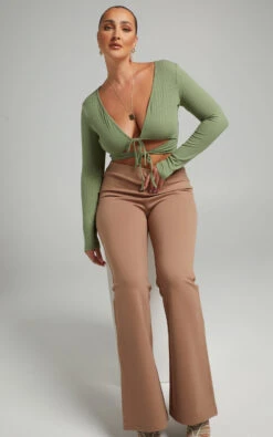 Showpo Margot Flared Pants In Camel 14 Showpo Margot Flared Pants In Camel -Showpo Women's Clothing Store MIKAYLA X LUCY X ANTHONY 01.11.2135186