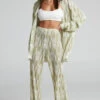 Showpo Marfy - Mid Rise Abstract Print Flared Plisse Pant In Green Marble