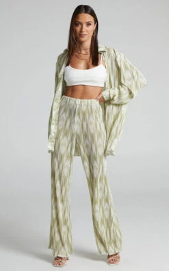 Showpo Marfy - Mid Rise Abstract Print Flared Plisse Pant In Green Marble
