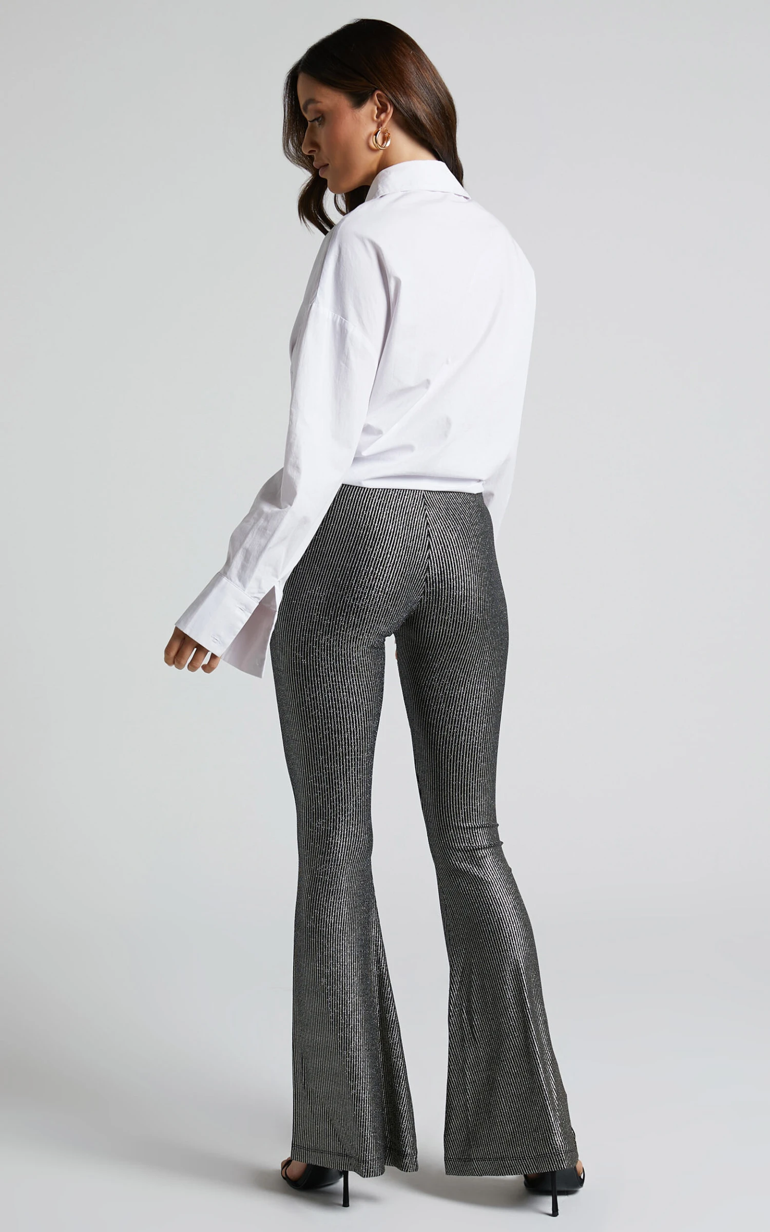 Showpo Merlin High Waisted Lurex Flared Pants In Black And Silver 6 Showpo Merlin High Waisted Lurex Flared Pants In Black And Silver - Image 6