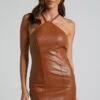 Showpo Minx Faux Leather Halter Mini Dress In Tan