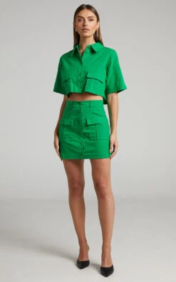 Showpo Navine Button Front Crop Top And Cargo Pocket Mini Skirt Two Piece Set In Green 14 Showpo Navine Button Front Crop Top And Cargo Pocket Mini Skirt Two Piece Set In Green -Showpo Women's Clothing Store Navine Two Piece Skirt Set with Pockets in Green 2528SC22030024022529