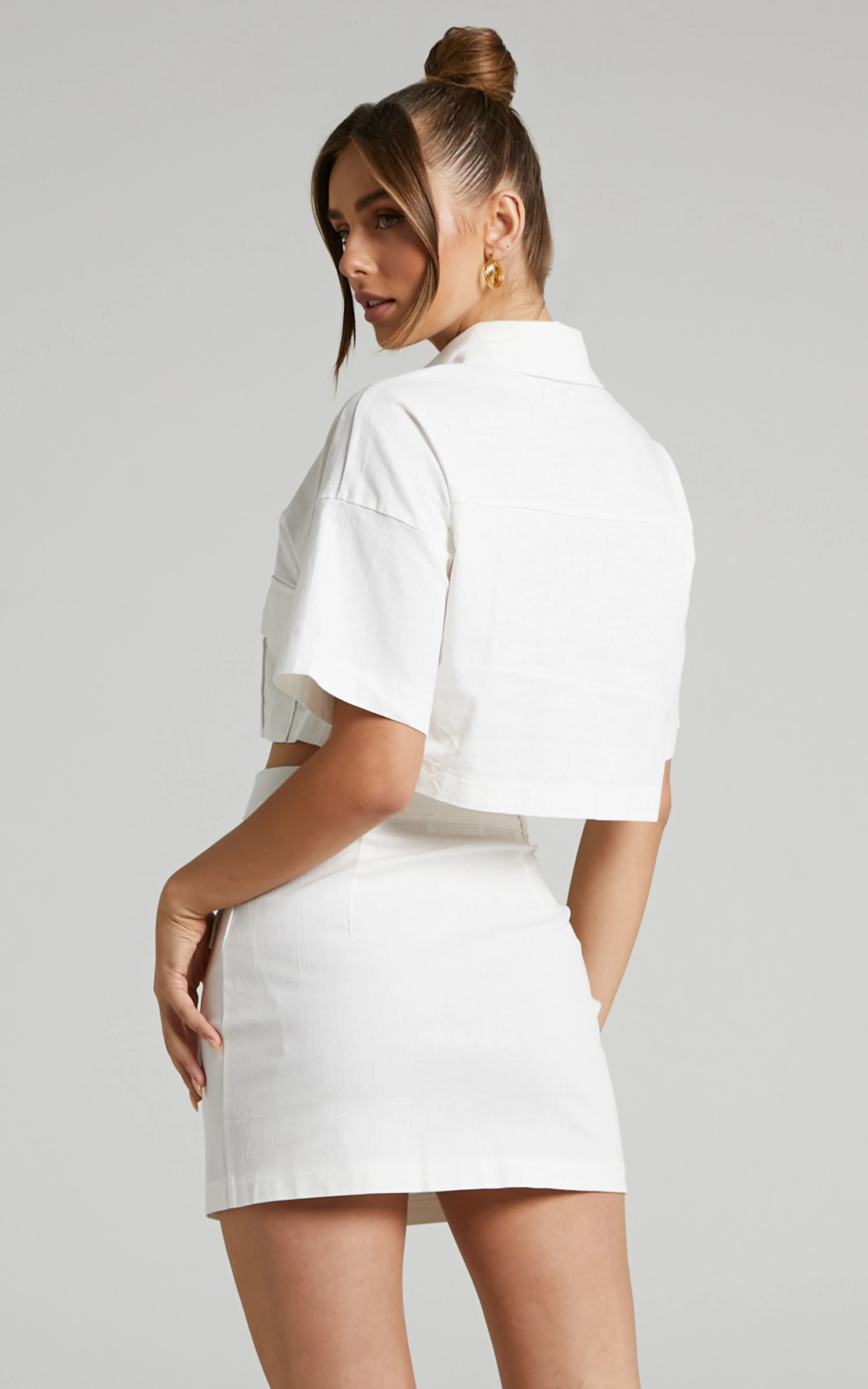 Showpo Navine Button Front Crop Top And Cargo Pocket Mini Skirt Two Piece Set In White 8 Showpo Navine Button Front Crop Top And Cargo Pocket Mini Skirt Two Piece Set In White - Image 8