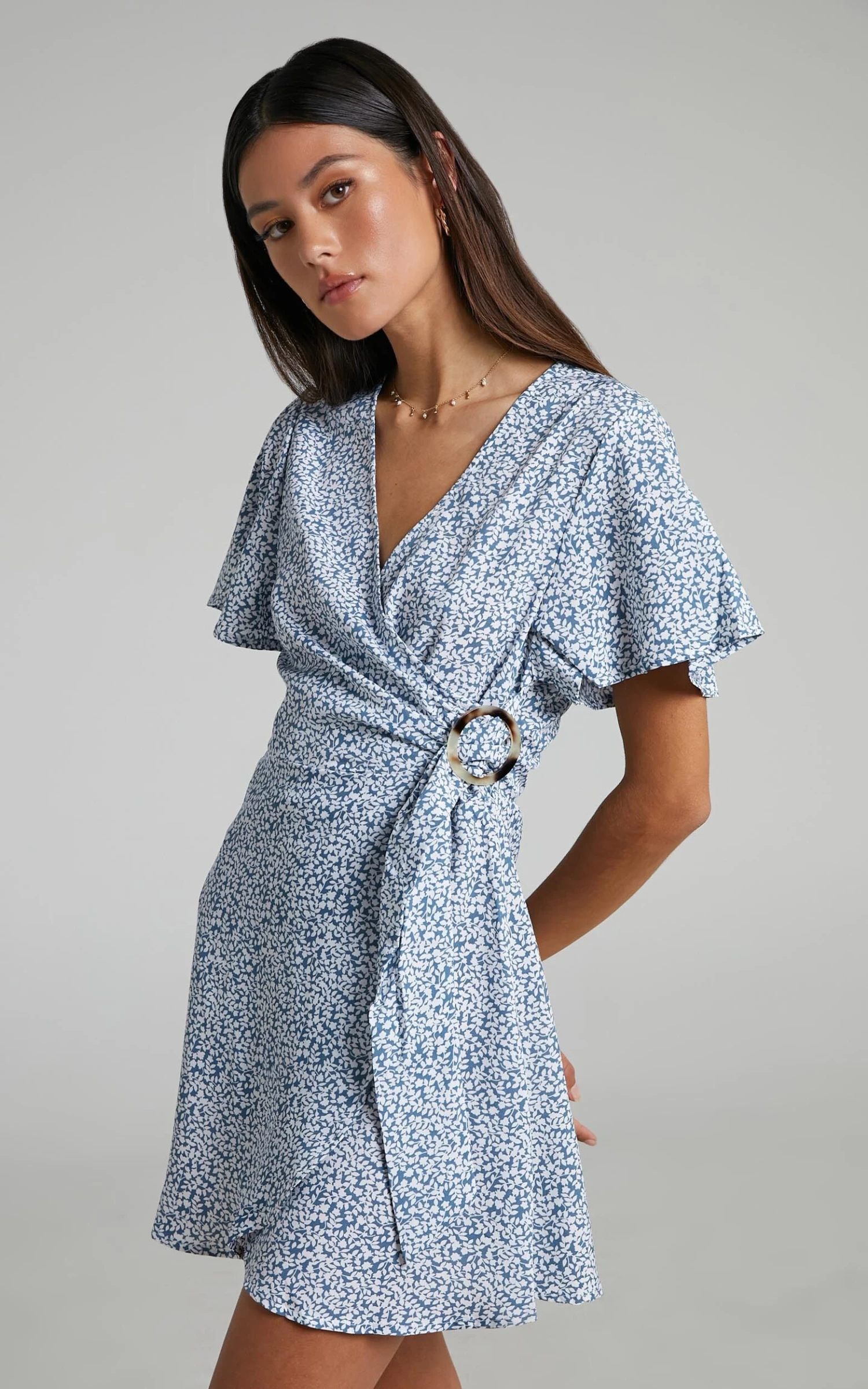 Showpo Prudence Flutter Sleeve Wrap Mini Dress In Blue Floral 3 Showpo Prudence Flutter Sleeve Wrap Mini Dress In Blue Floral - Image 3