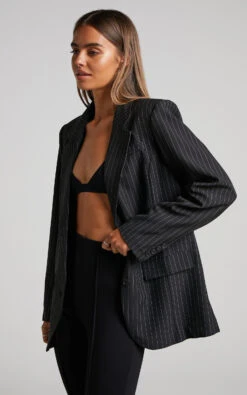 Showpo Queennie Blazer - Oversized Single Breasted Blazer In Black Pinstripe 11 Showpo Queennie Blazer - Oversized Single Breasted Blazer In Black Pinstripe -Showpo Women's Clothing Store Queennie Blazer Oversized Single Breasted Pinstripe Blazer in Black Pinstripe 2528SO22100005012529 8