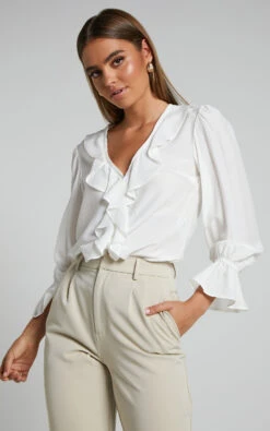 Showpo Royalene Frill Detail Balloon Sleeve Shirt In Off White 13 Showpo Royalene Frill Detail Balloon Sleeve Shirt In Off White -Showpo Women's Clothing Store Royalene Frill Detail Balloon Sleeve Shirt in Off White 7