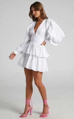 Showpo Suki Mini Dress - Plunge Neck Balloon Sleeve Tiered Ruffle Dress In White 9 Showpo Suki Mini Dress - Plunge Neck Balloon Sleeve Tiered Ruffle Dress In White -Showpo Women's Clothing Store Suki Frill Dress with bodice in White 2528SD22050011012529 2