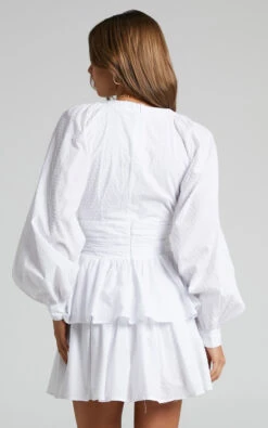 Showpo Suki Mini Dress - Plunge Neck Balloon Sleeve Tiered Ruffle Dress In White 10 Showpo Suki Mini Dress - Plunge Neck Balloon Sleeve Tiered Ruffle Dress In White -Showpo Women's Clothing Store Suki Frill Dress with bodice in White 2528SD22050011012529 3