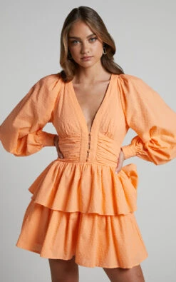 Showpo Suki Mini Dress - Plunge Neck Balloon Sleeve Tiered Ruffle Dress In Sherbet 11 Showpo Suki Mini Dress - Plunge Neck Balloon Sleeve Tiered Ruffle Dress In Sherbet -Showpo Women's Clothing Store Suki Mini Dress Plunge Neck Balloon Sleeve Tiered Ruffle Dress in Mango 2