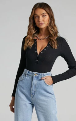 Showpo Tatem Longsleeve Button Front Bodysuit In Black