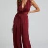Showpo Zarina Plunge Neck Twist Back Jumpsuit In Maroon